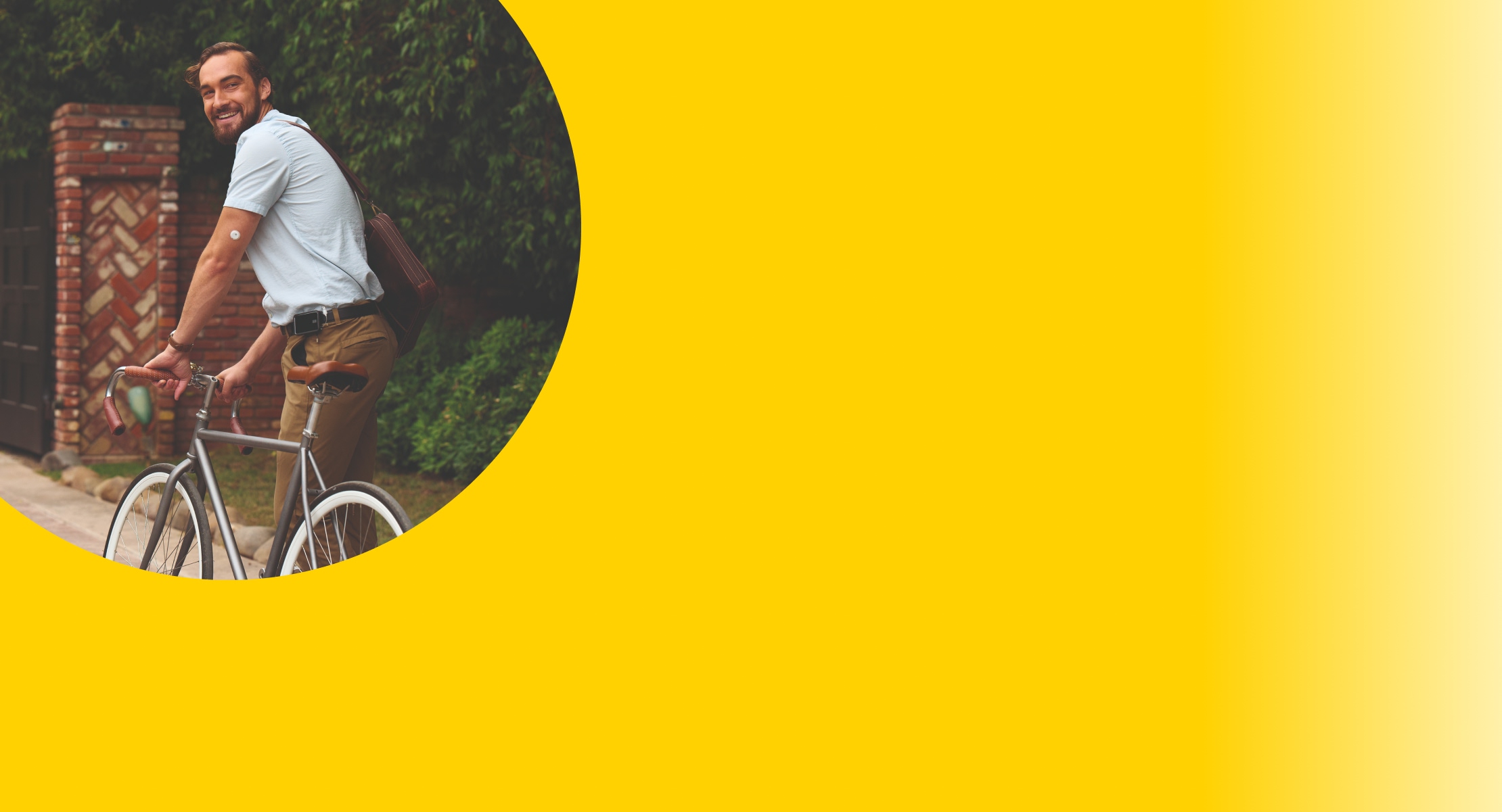 an image of a man moving his bicycle with a visible sensor on his arm
