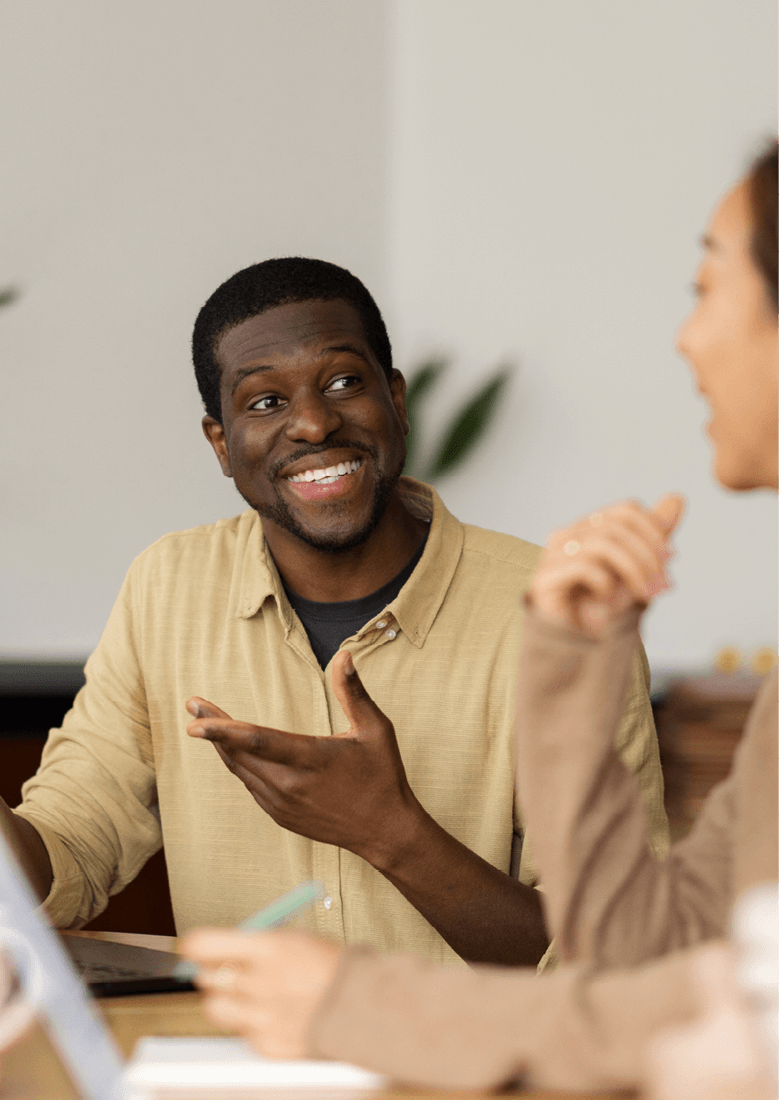 an image of a man looking excited and having a conversation
