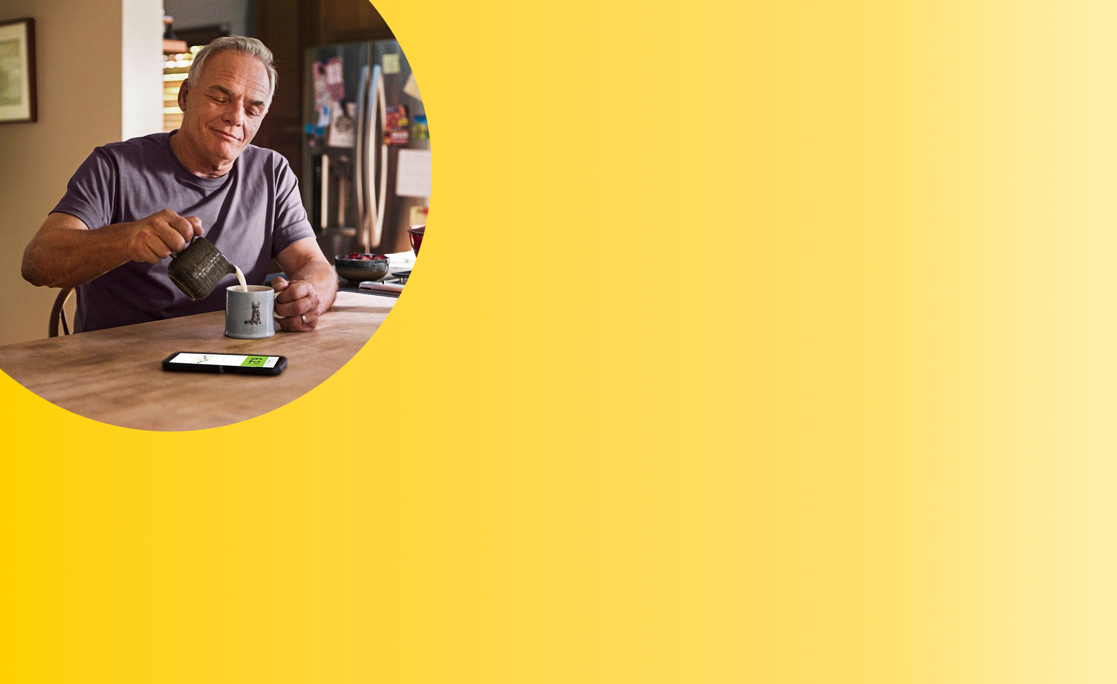 Man wearing FreeStyle Libre 3 Plus sensor in kitchen