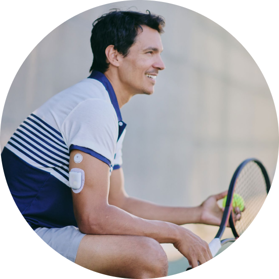 Man wearing FreeStyle Libre 3 Plus sensor and Omnipod system