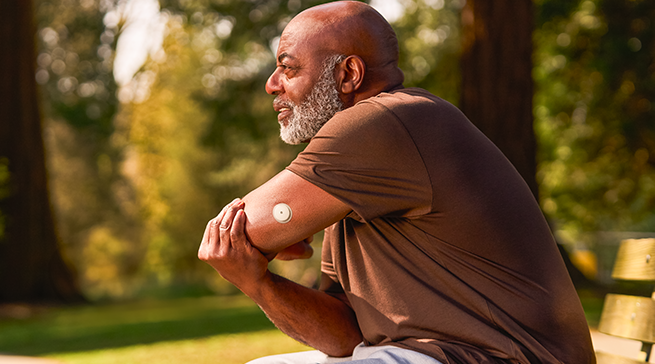 Man wearing FreeStyle Libre sensor