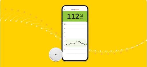 FreeStyle Libre 2 sensor and the FreeStyle LibreLink app shown on a smartphone.