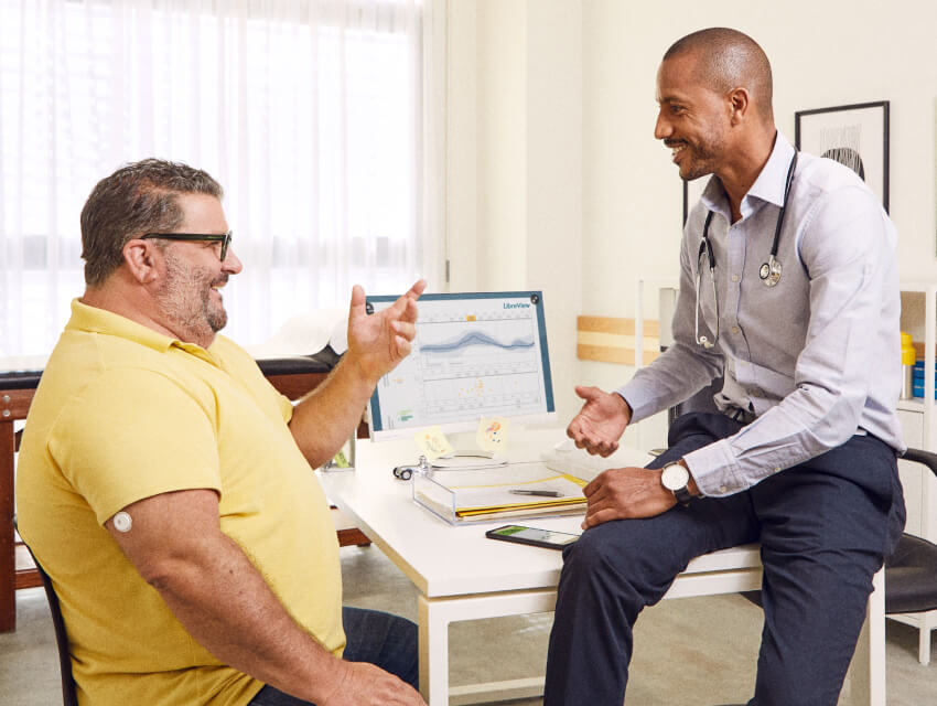 Healthcare professional advising patient