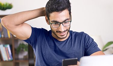 A patient checking his phone