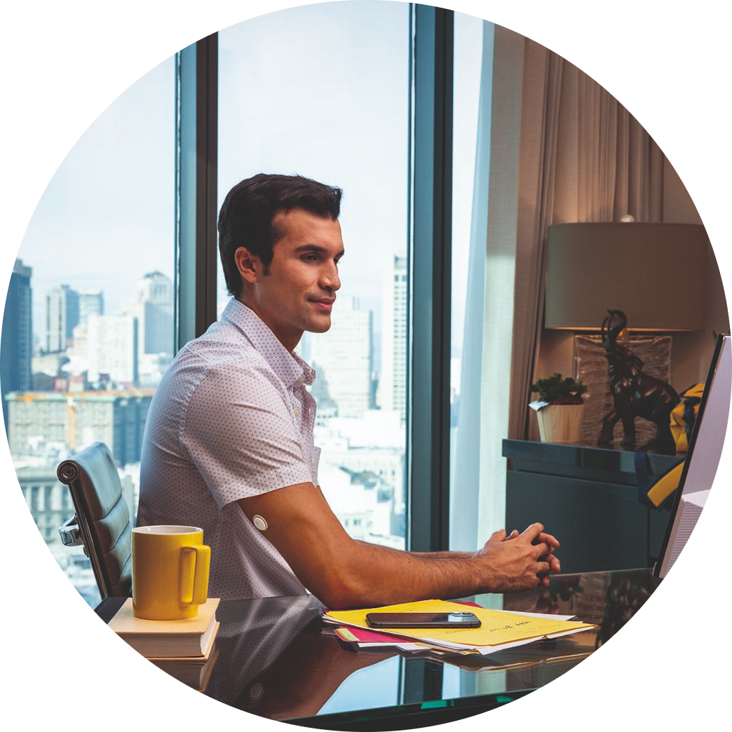 Patient sitting at desk joining virtual training