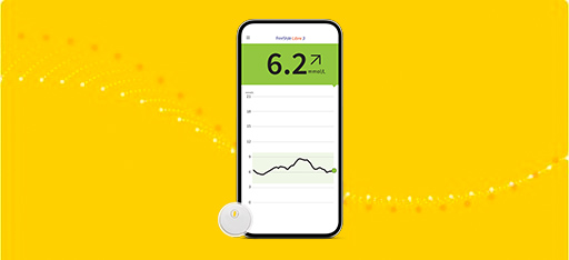 FreeStyle Libre 3 sensor and the FreeStyle LibreLink app shown on a smartphone.